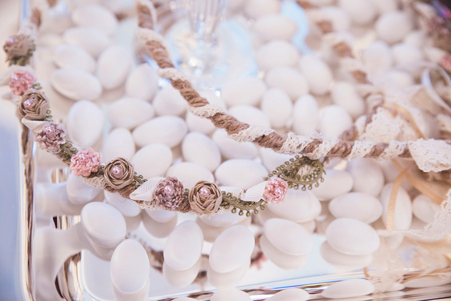 Greek wedding. stefana. wedding crowns. Orthodox church. Bride and groom. Chios, Greece. Alepa Katerina . Layer Photography