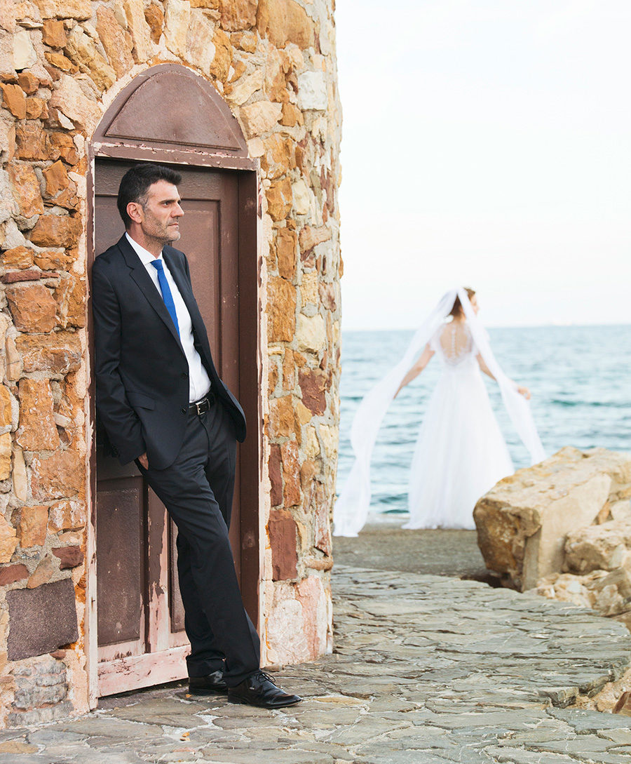 Wedding Photoshooting.Groom portrait. near the sea. greek wedding . Chios , Greece. greek island. Couple photoshooting. Love and married. Alepa Katerina . Layer Photography