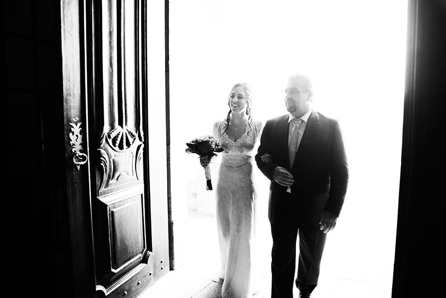 Bride with her father just arrived in the church. Santuário de Nossa Senhora dos Remédios, Shrine of Our Lady of Remedies the cathedral in Lamego.Portugal. Layer Photography. Alepa Katerina