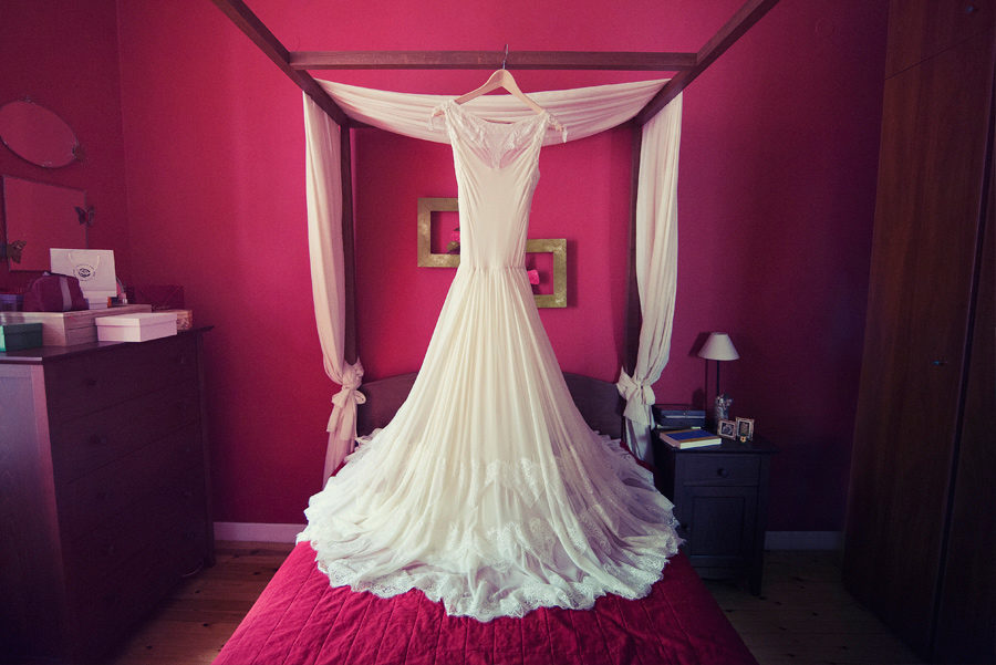 The wedding dress. Red for passion . Vintage . bedroom . Layer Photography. Alepa Katerina , Thessaloniki. Greece