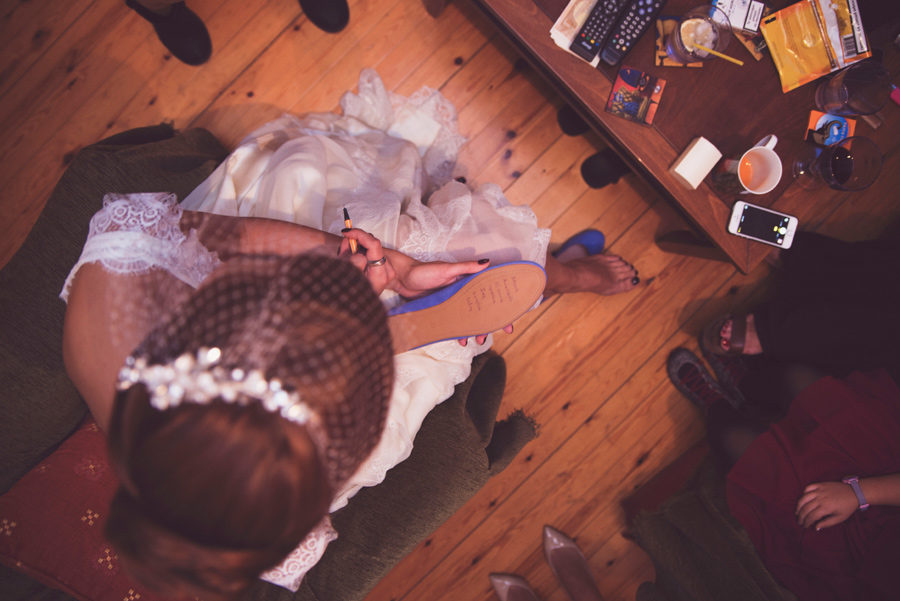 Bride's preparation. Write the names of the single ladies in the wedding shoes. Civil wedding in Thessaloniki, Greece