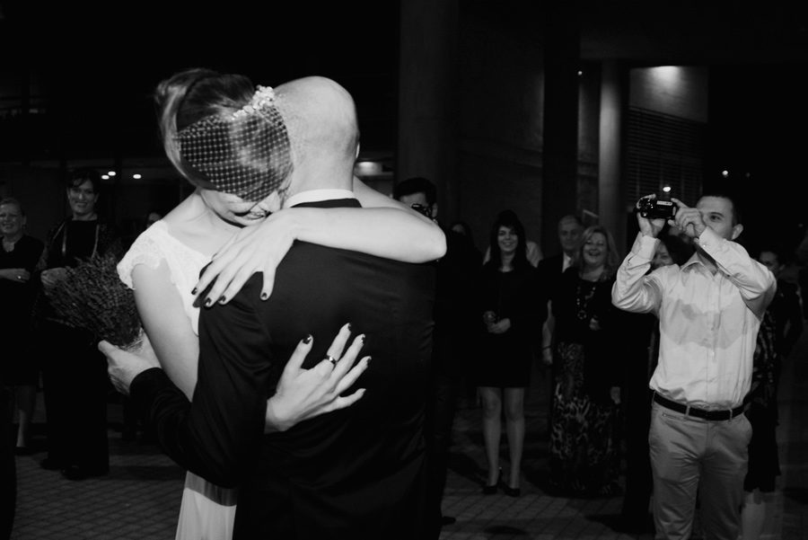 Town hall. Couple in love. Happy life, bride and groom. Hug before the wedding. Paparazzi. Happy friends. Civil wedding in Thessaloniki, Greece