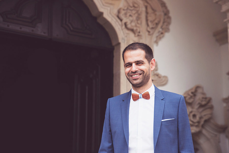 Groom smiles. He is waiting his love . Santuário de Nossa Senhora dos Remédios, Shrine of Our Lady of Remedies the cathedral in Lamego.Portugal. Layer Photography. Alepa Katerina