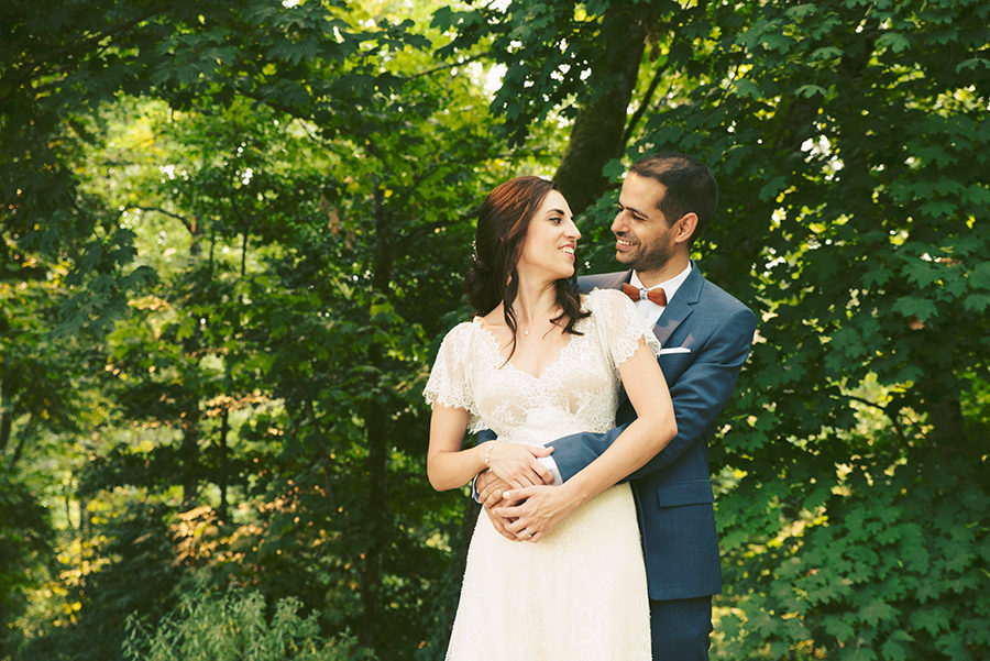 Couple's portrait in the woods.Santuário de Nossa Senhora dos Remédios, Shrine of Our Lady of Remedies the cathedral in Lamego.Portugal . Layer Photography. Alepa Katerina